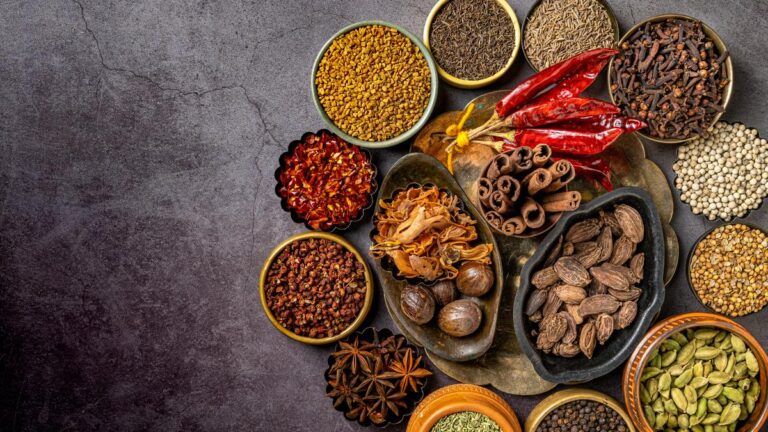 095483500_1722499498-top-view-various-indian-spices-seasonings-table.jpg